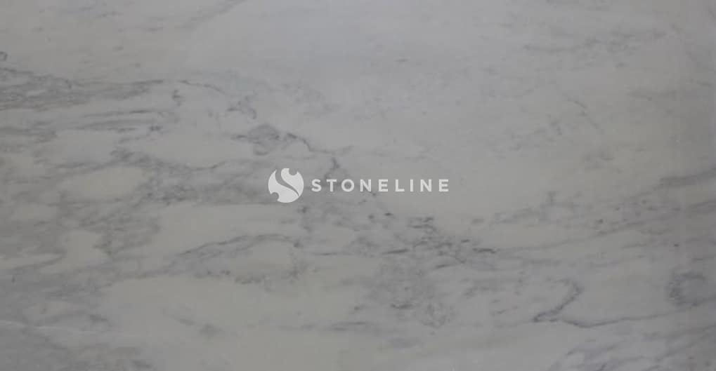 Close-up of light gray stone texture surface.