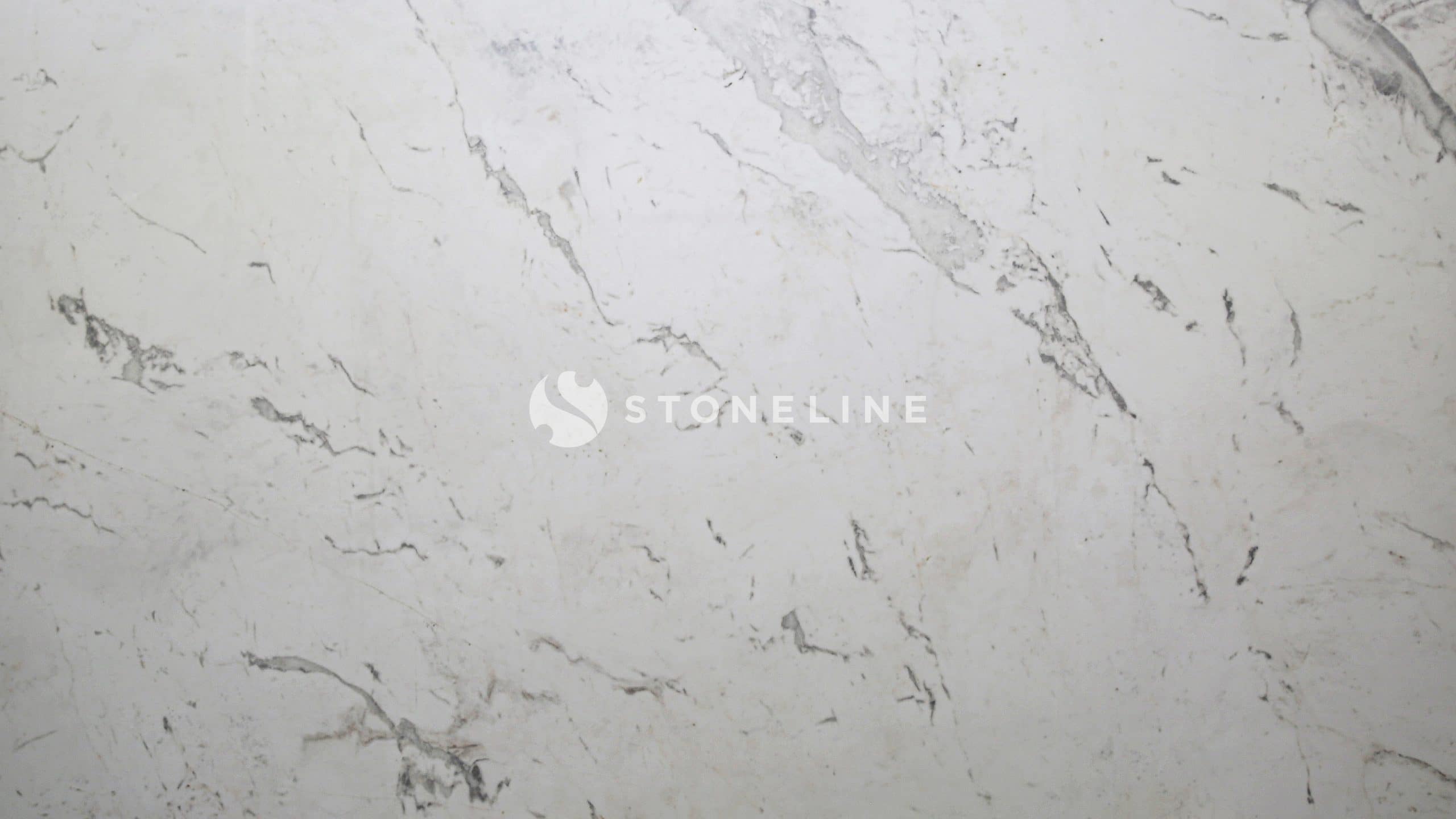 Light marble texture with subtle gray veining.