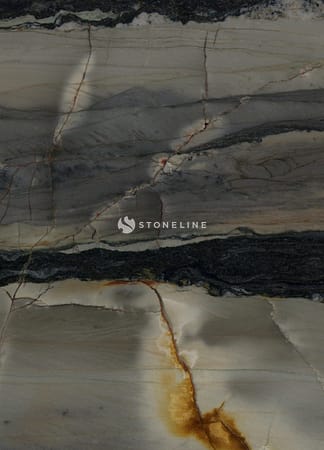 Textured stone slab with dark and light veins.