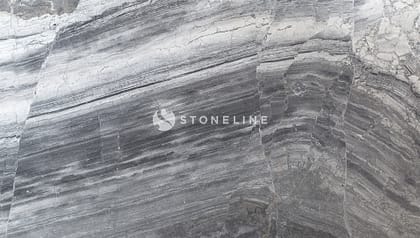 Close-up of striated gray marble texture.