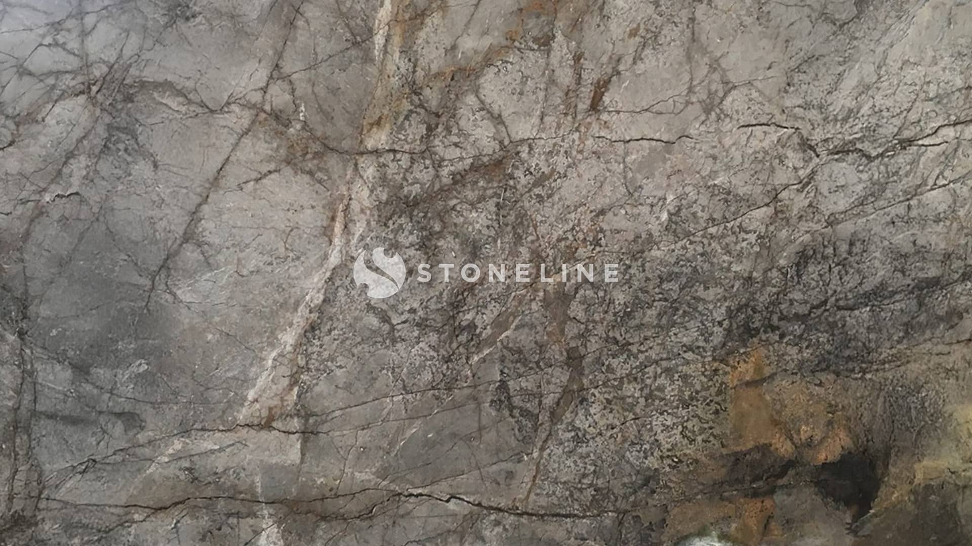Natural stone texture with gray and brown patterns.