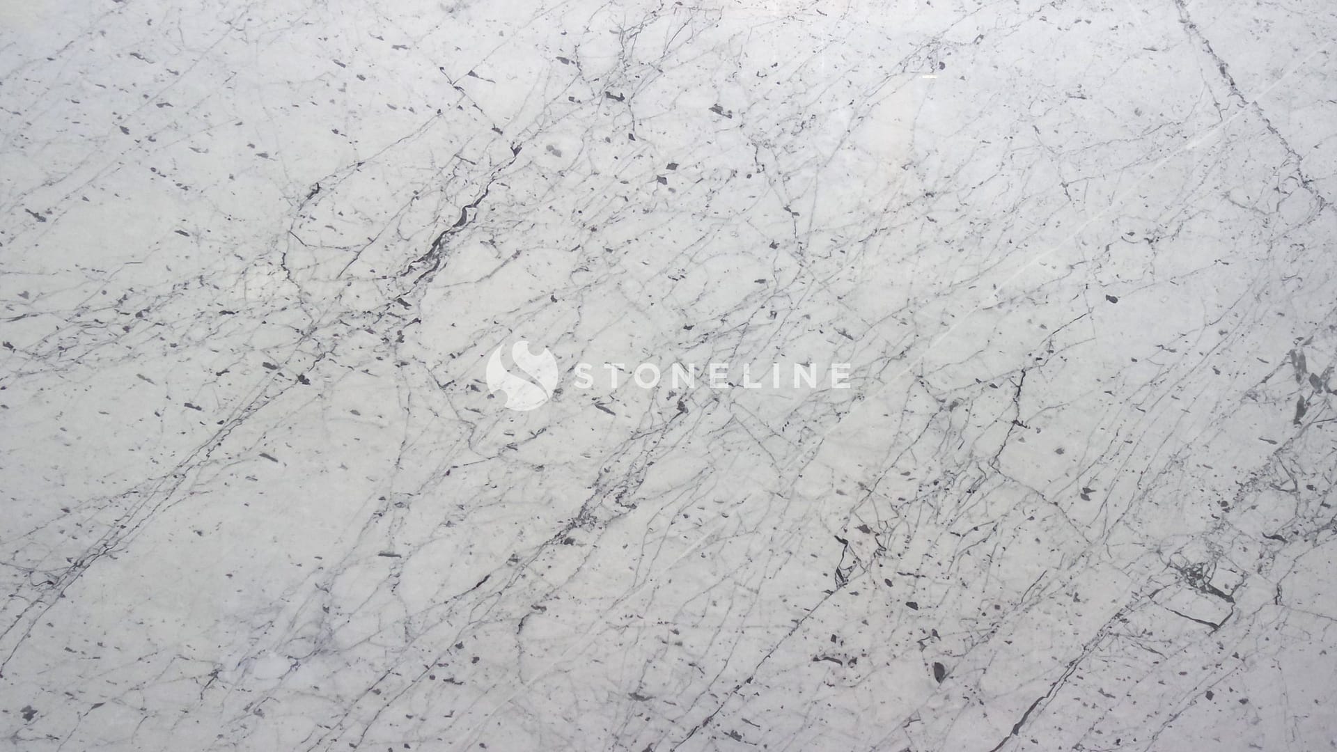 White marble texture with gray veins and spots.
