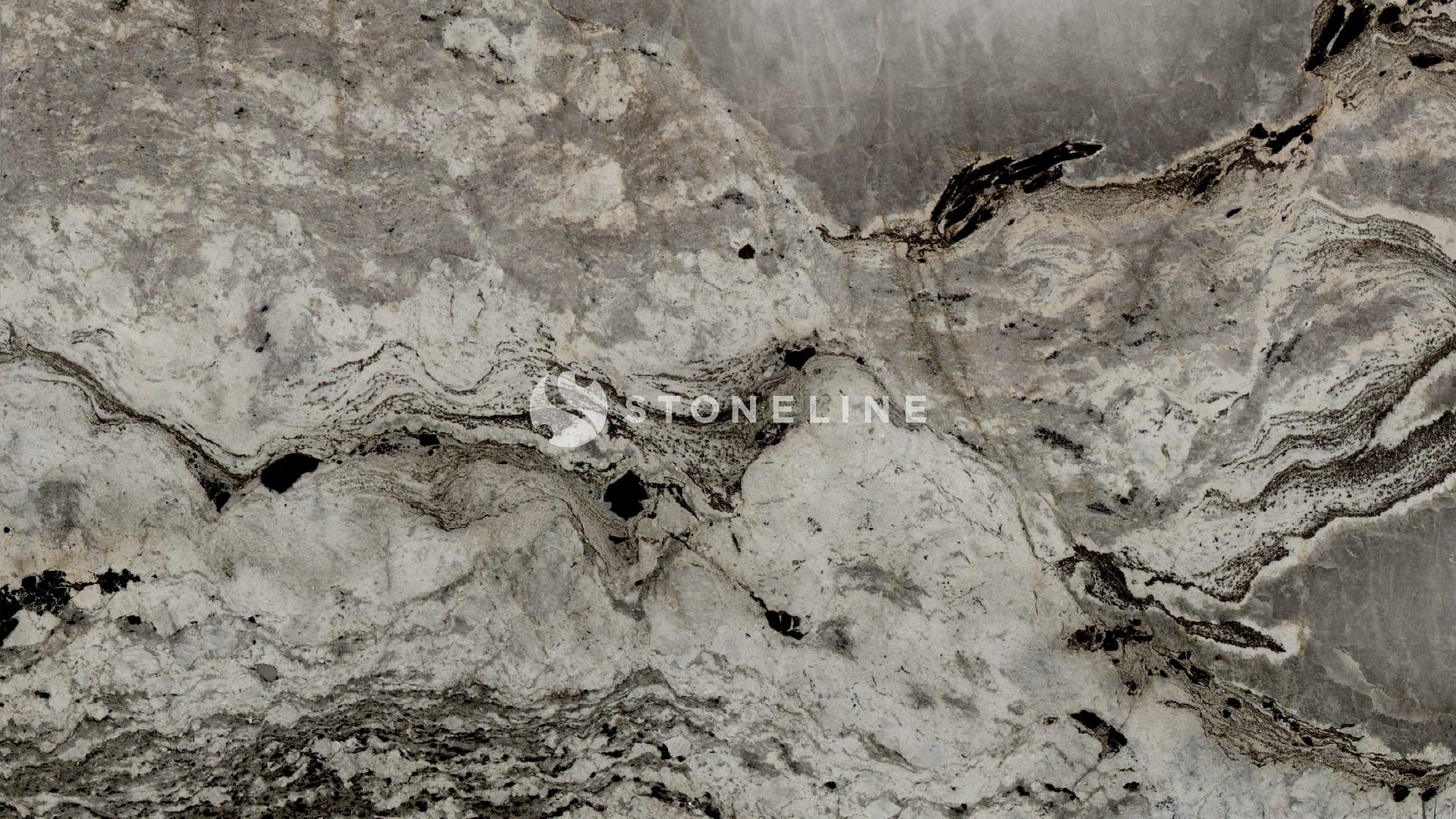 Close-up of textured gray stone slab surface.