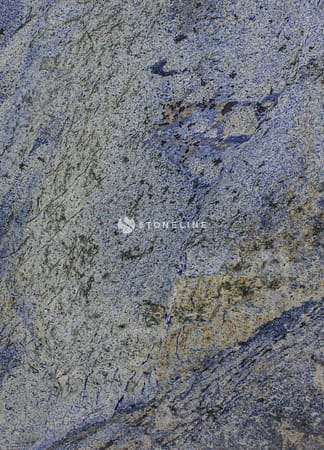 Close-up of textured blue and gray granite surface.