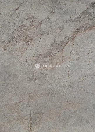 Close-up of gray stone texture with natural patterns.