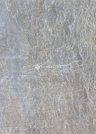 Gray textured stone surface with natural patterns.