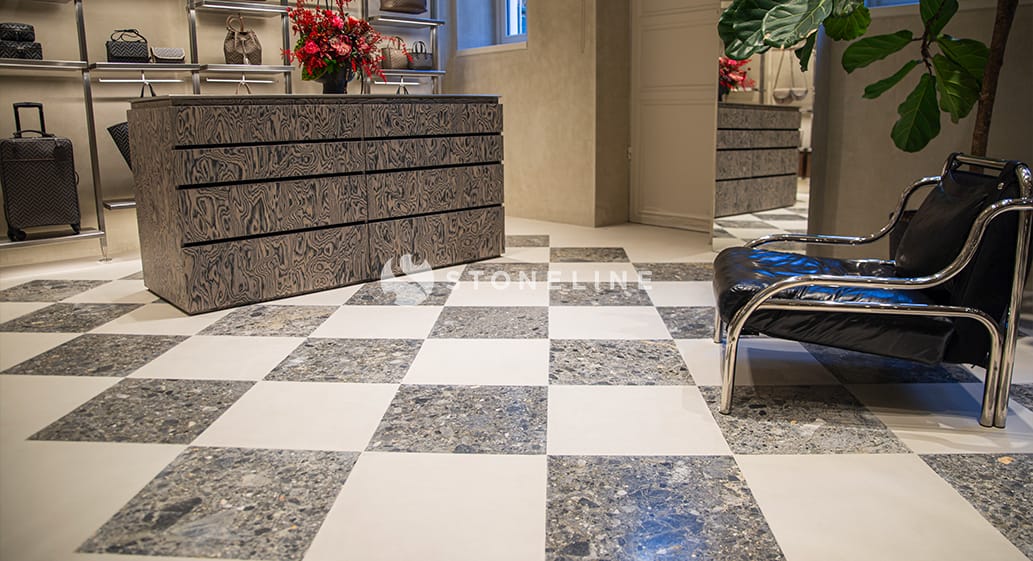 Luxury store interior with checkered floor and furniture.
