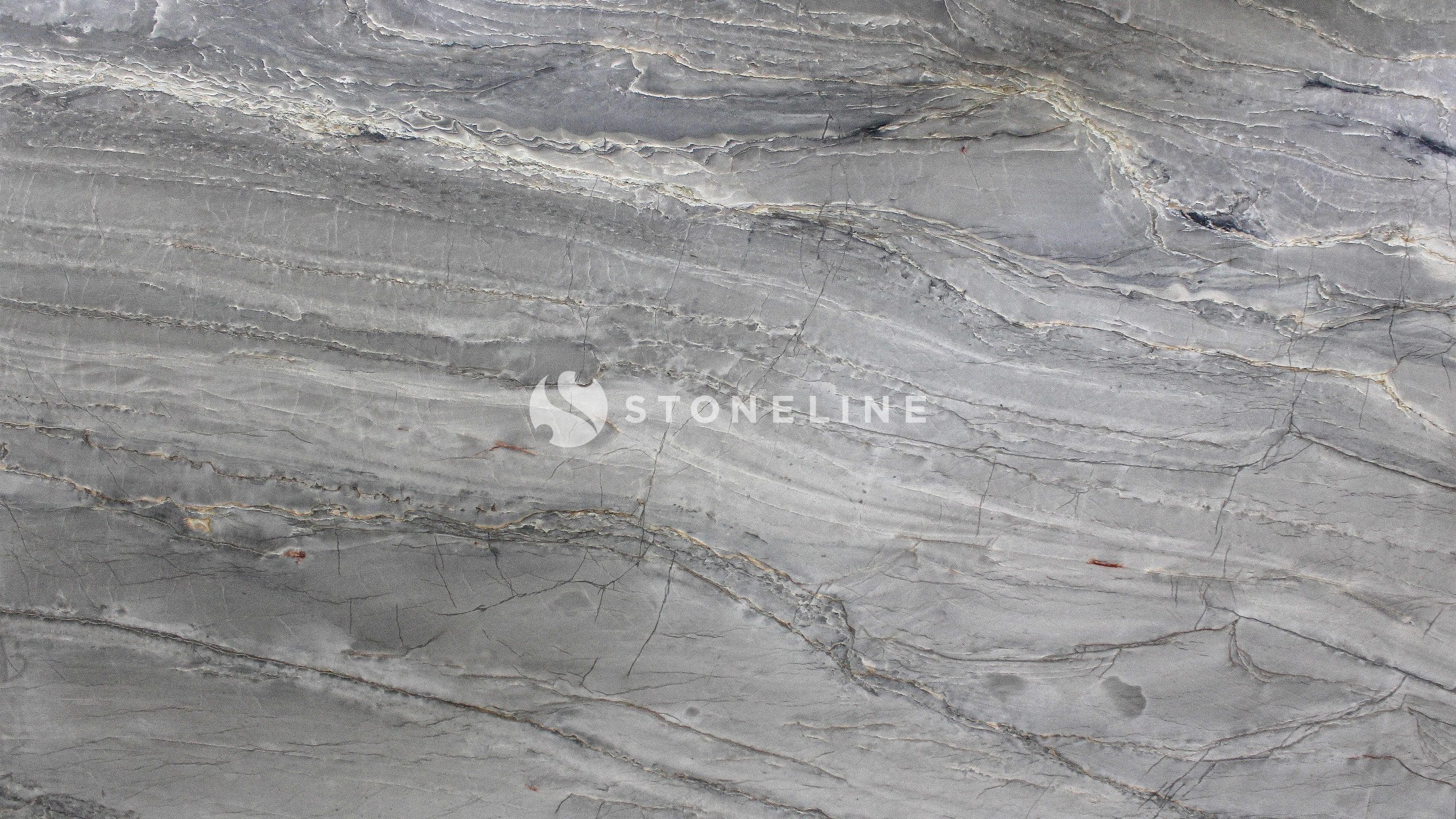Close-up of gray marble surface with veins