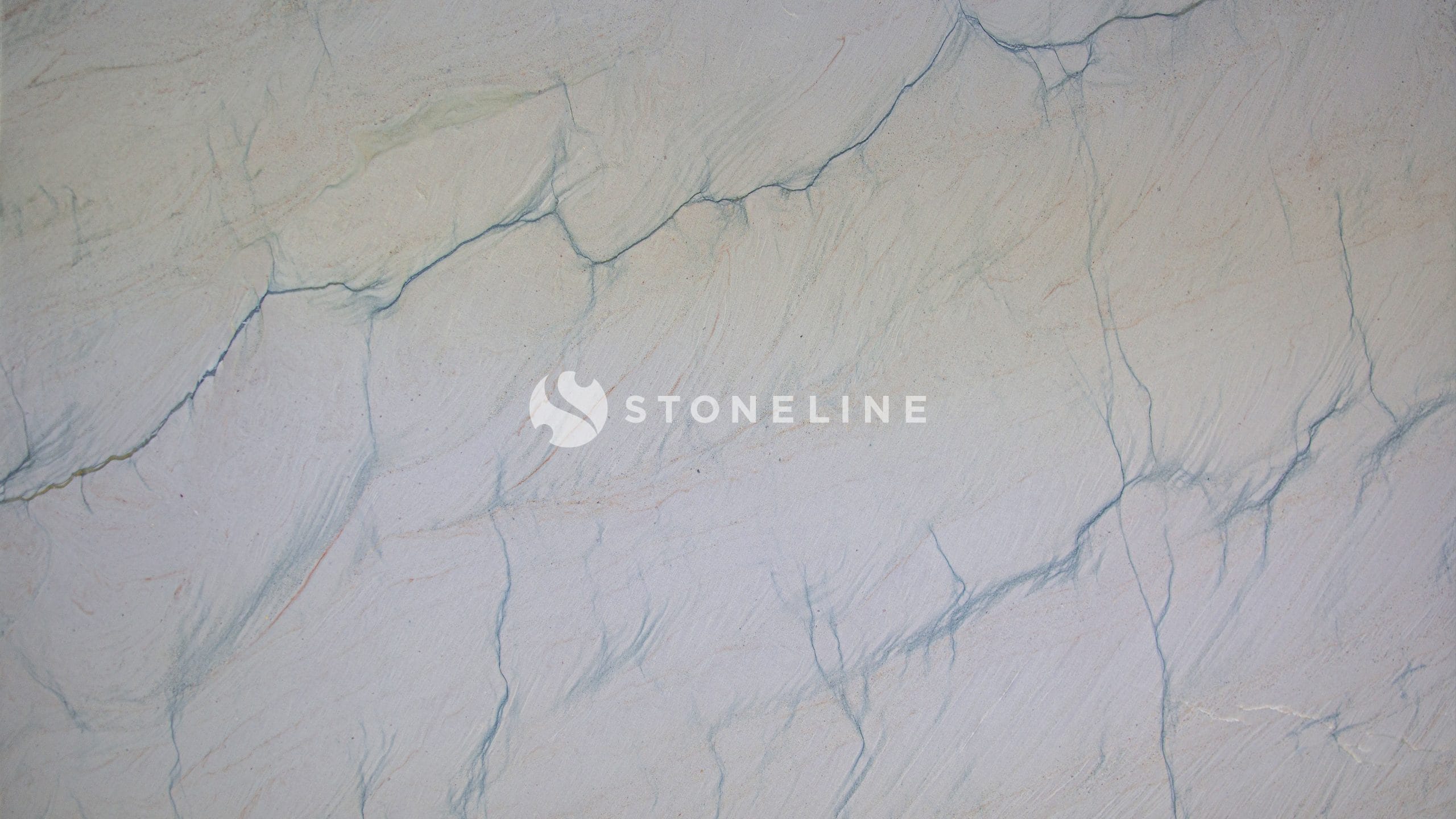 Close-up of cracked marble surface texture.
