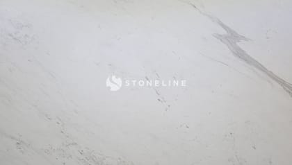 White marble surface with subtle gray veins.