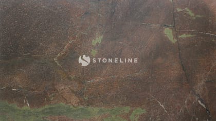 Close-up of textured brown and green stone surface.