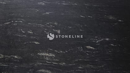 Dark textured stone background with subtle patterns