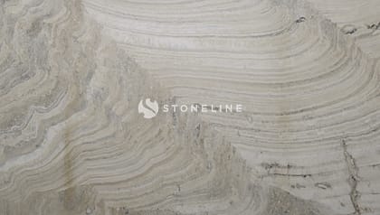 Close-up of beige stone texture with lines