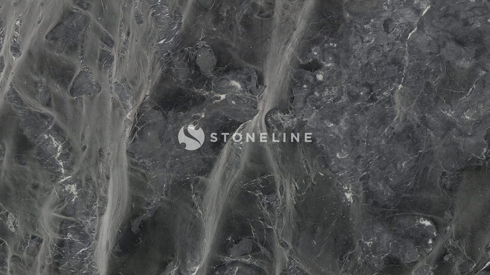 Dark marble surface with white veining patterns.