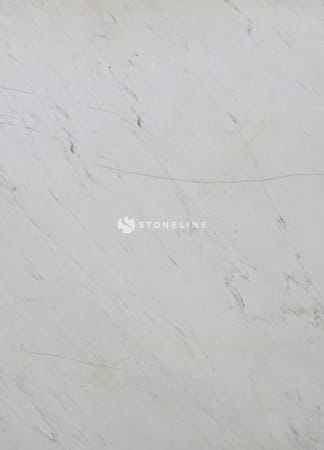 Close-up of white marble texture with veins