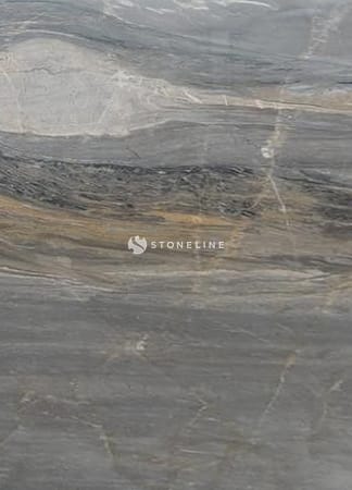 Gray marble surface with natural veins and patterns.