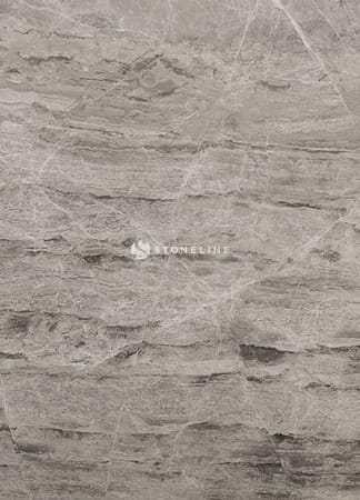 Close-up of gray marble texture with veins.