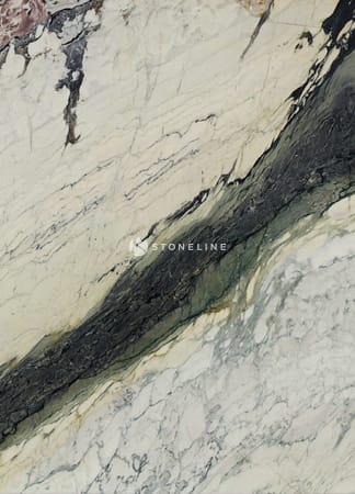 Close-up of textured marble surface with dark veins.