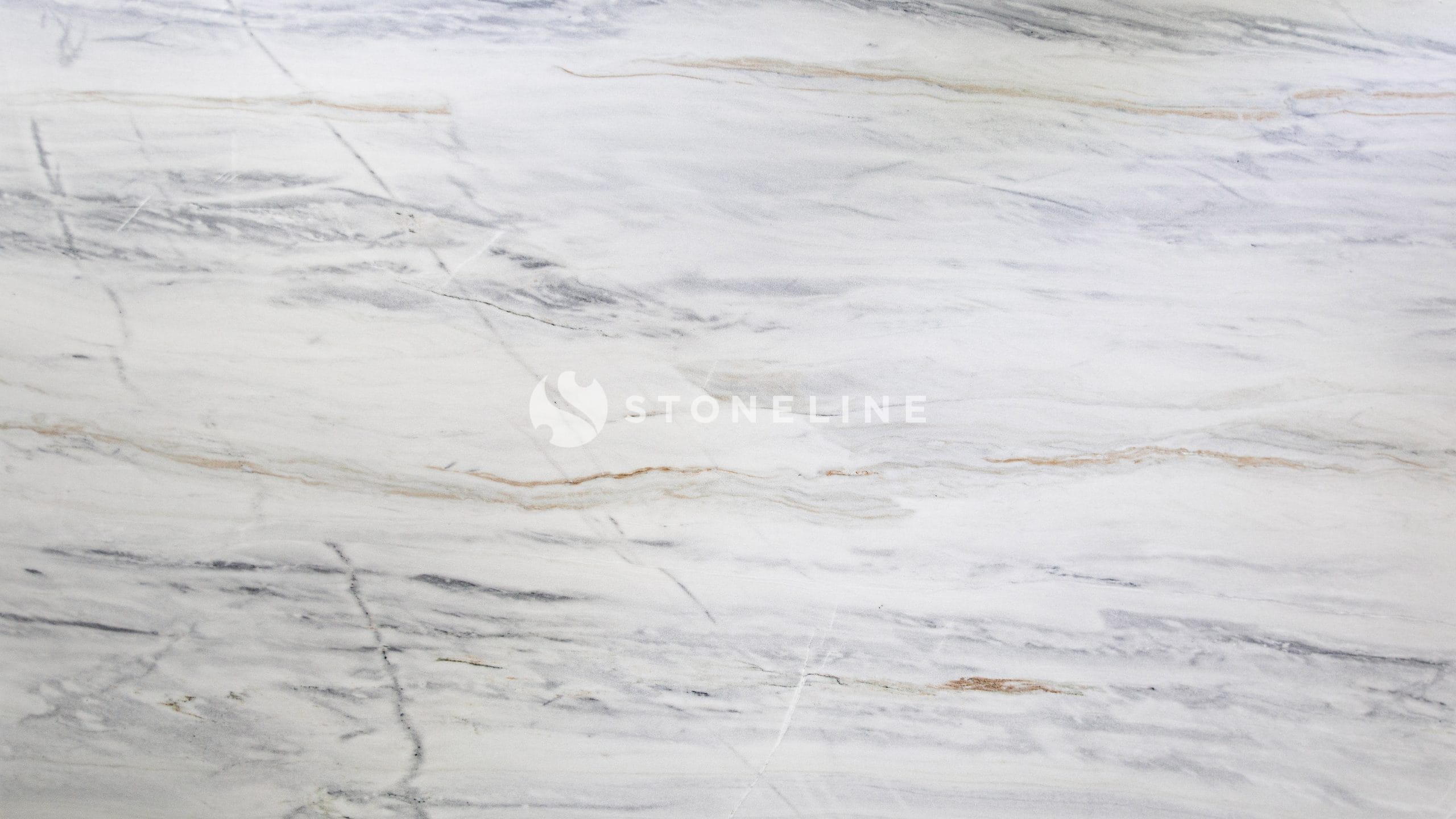 White marble surface with gray and brown veins