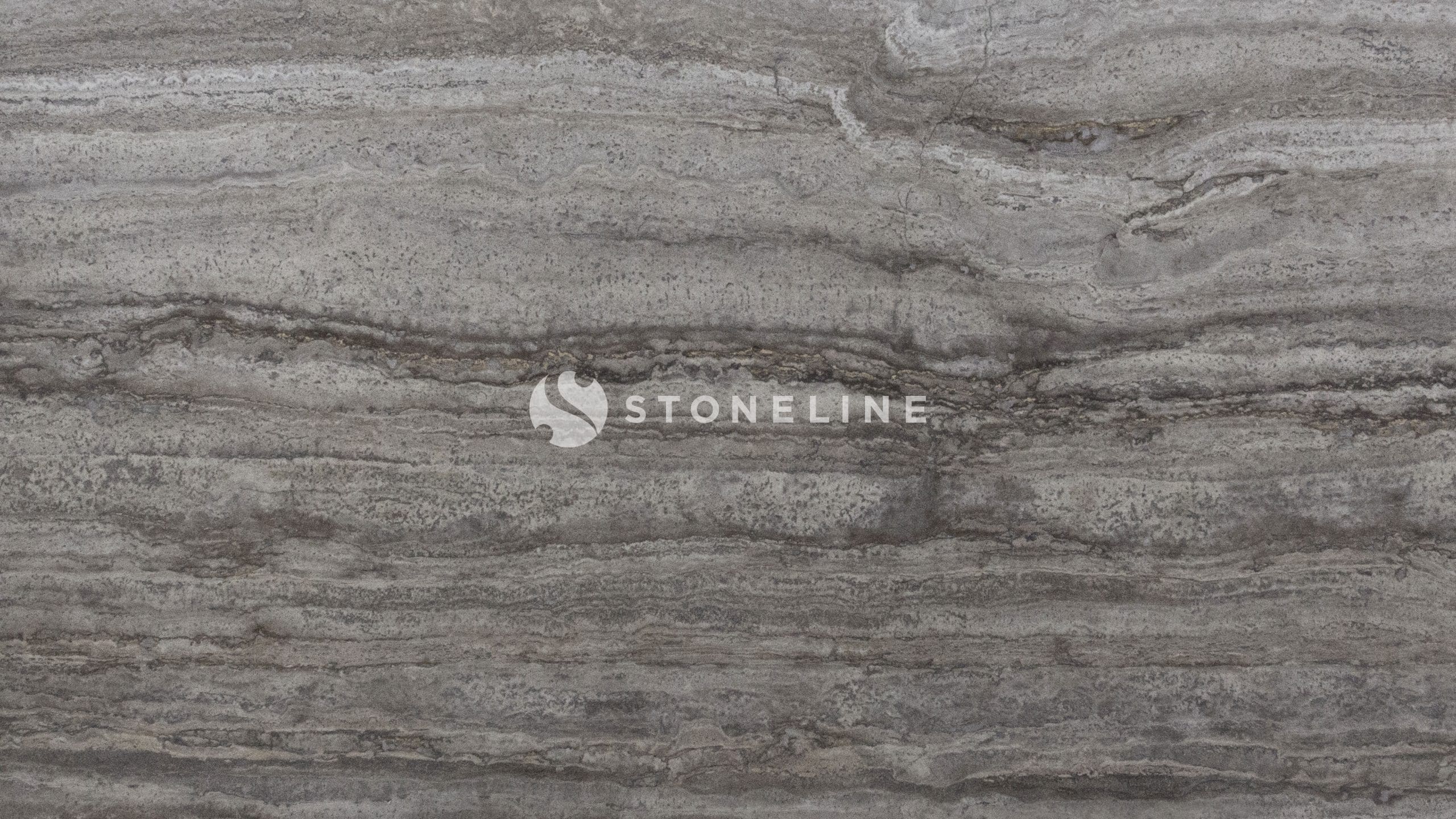 Gray textured stone surface with layered patterns.