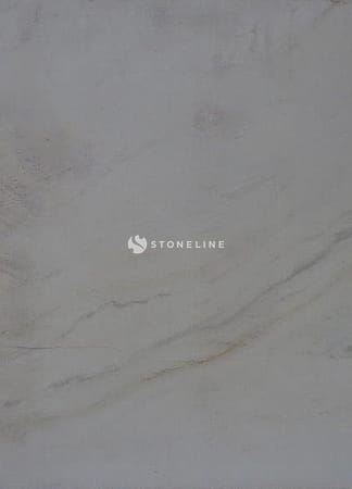 Close-up of light beige marble texture.