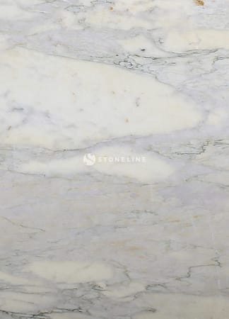 White marble surface with gray veining detail.