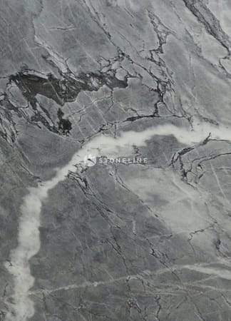 Dark gray marble texture with white veins.