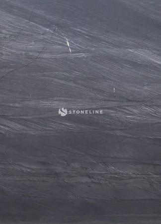 Gray textured stone surface with natural patterns