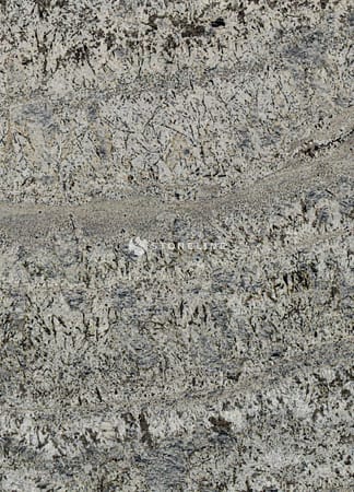 Close-up of textured gray and black granite surface.