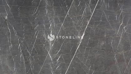 Dark marble surface with white veins