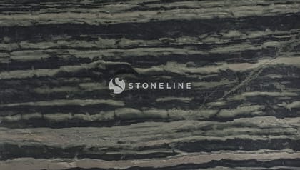 Close-up of dark layered rock texture.