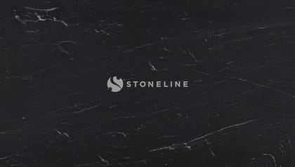 Black textured marble surface with subtle white veins.